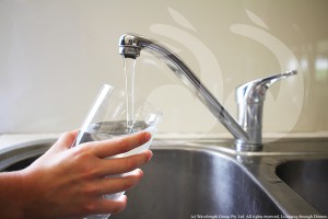 Pouring a glass of Scone tap water.